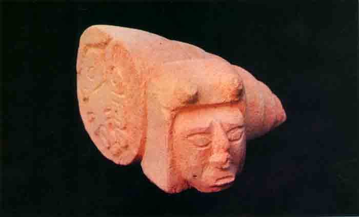 Representacion del cero en su forma glífica y de caracol, creación de un artesano de la villa de Muna.