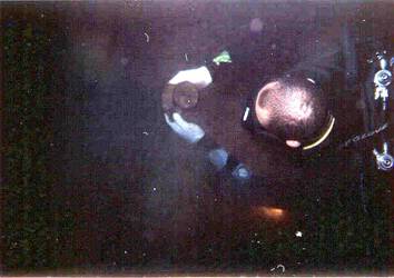 Photo 10. Recovering archaeological material from a cenote. (Collaboration with the INAH Center in Yucatan).