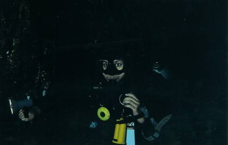 Photo 13. Diana Gutierrez during the exploration of a cave.